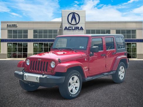 Used 2012 Jeep Wrangler Unlimited Sahara w/ Connectivity Group AWD/4WD image 1