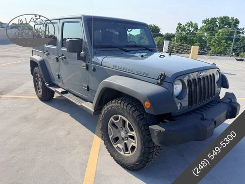 Used 2014 Jeep Wrangler Unlimited Rubicon w/ Max Tow Package AWD/4WD image 3