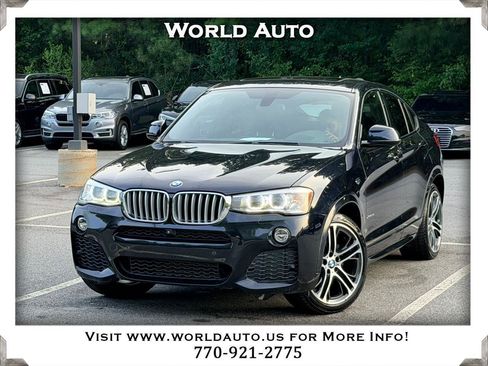 Used 2016 BMW X4 xDrive28i AWD/4WD image 1
