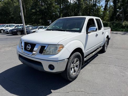 Used 2009 Nissan Frontier SE w/ SE Value Truck Pkg AWD/4WD image 1