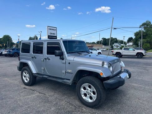 Used 2013 Jeep Wrangler Unlimited Sahara w/ Connectivity Group AWD/4WD image 1
