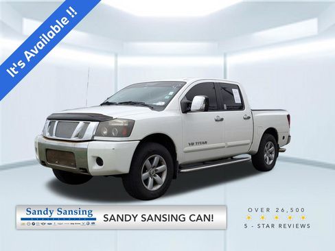 Used 2010 Nissan Titan SE w/ SE Premium Utility Pkg RWD image 1