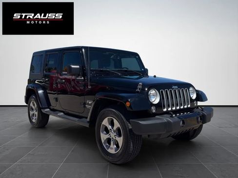 Used 2016 Jeep Wrangler Unlimited Sahara AWD/4WD image 1