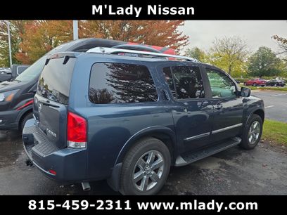 Used 2014 Nissan Armada Platinum w/ 2nd Row Captain Seat Package