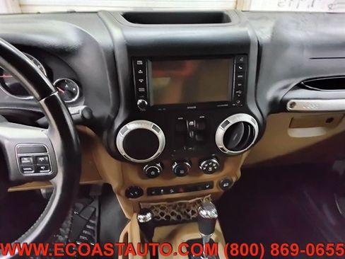 Used 2012 Jeep Wrangler Unlimited Sahara w/ Dual Top Group AWD/4WD image 12