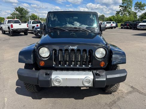 Used 2012 Jeep Wrangler Unlimited Sahara w/ Dual Top Group AWD/4WD image 8