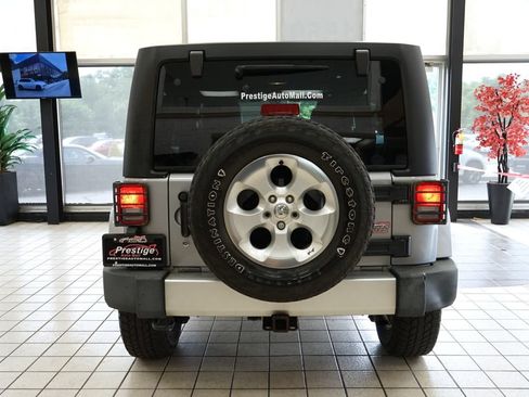 Used 2014 Jeep Wrangler Unlimited Sahara w/ Dual Top Group AWD/4WD image 15