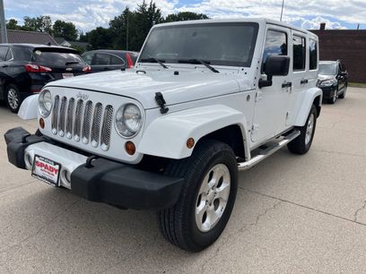 Used 2011 Jeep Wrangler Unlimited Sahara w/ Dual Top Group