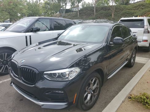 Used 2021 BMW X4 xDrive30i AWD/4WD image 1