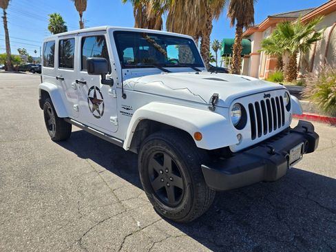 Used 2015 Jeep Wrangler Unlimited Sahara image 1