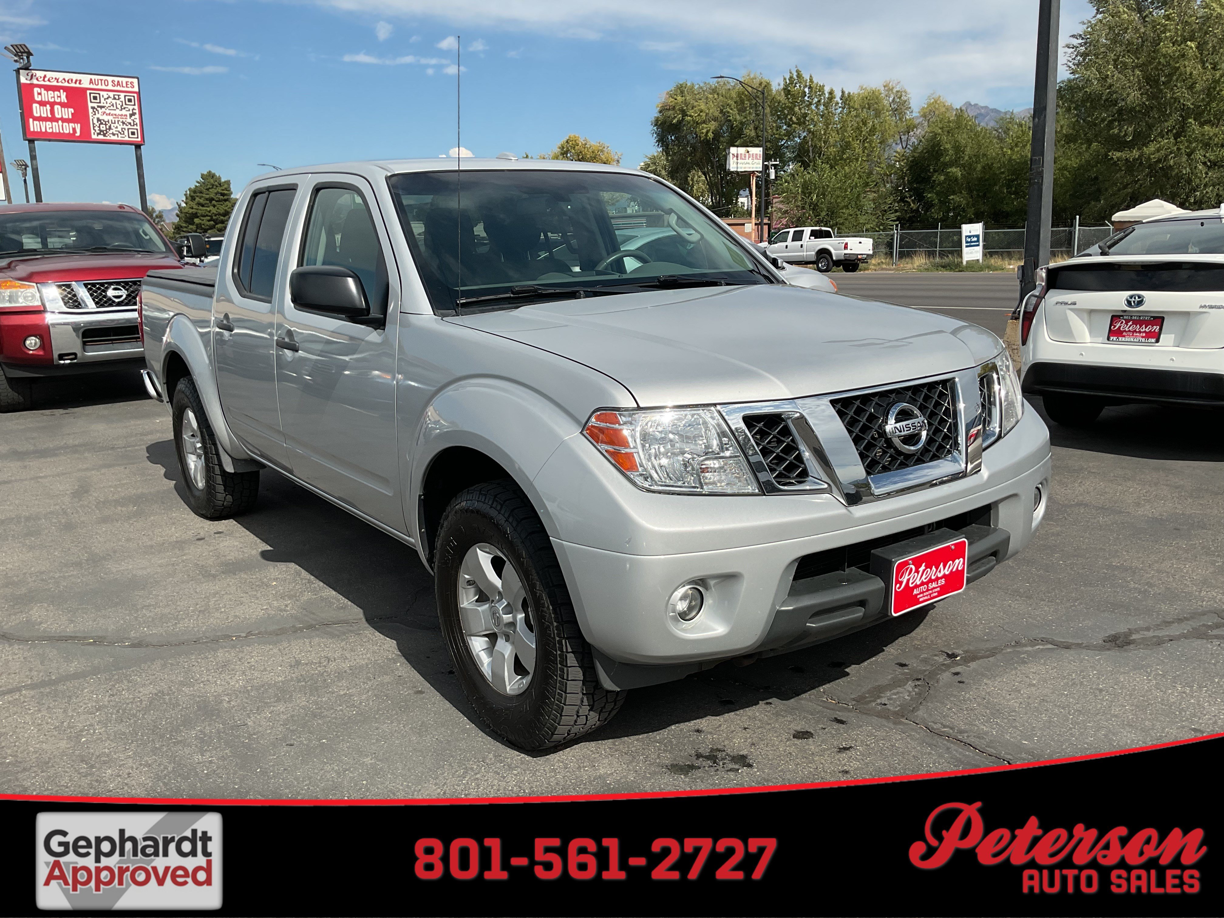 Used 2013 Nissan Frontier SV w/ SV Value Truck Pkg AWD/4WD image 1