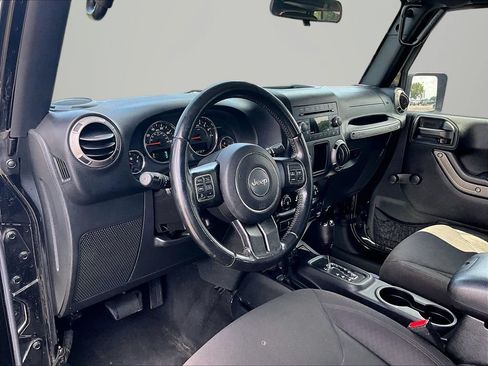 Used 2016 Jeep Wrangler Unlimited Sport w/ Mopar Black Appearance Group AWD/4WD image 13