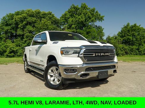 Used 2024 RAM 1500 Laramie AWD/4WD image 1