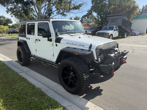 Used 2014 Jeep Wrangler Unlimited Rubicon w/ Dual Top Group AWD/4WD image 2