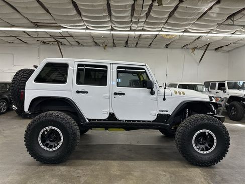 Used 2013 Jeep Wrangler Unlimited Sport AWD/4WD image 2