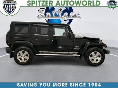 Used 2009 Jeep Wrangler Unlimited Sahara w/ Dual Top Group AWD/4WD image 11