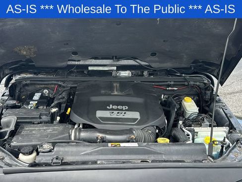 Used 2012 Jeep Wrangler Unlimited Sahara w/ Dual Top Group AWD/4WD image 12