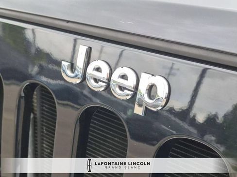 Used 2014 Jeep Wrangler Unlimited Sahara AWD/4WD image 9