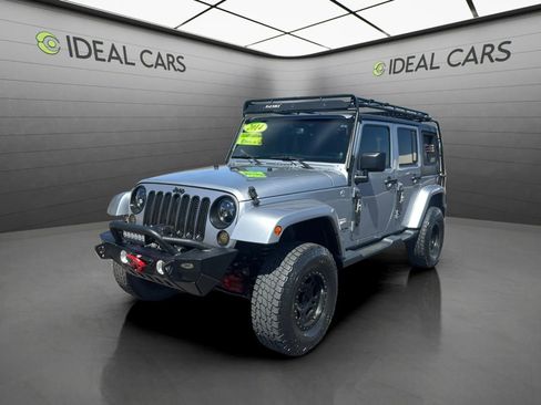 Used 2014 Jeep Wrangler Unlimited Sahara w/ Connectivity Group AWD/4WD image 1