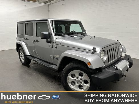 Used 2014 Jeep Wrangler Unlimited Sahara w/ Connectivity Group AWD/4WD image 1