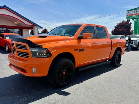 Used 2015 RAM 1500 Sport w/ Ignition Orange Sport Package AWD/4WD image 1