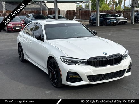 Used 2021 BMW 330i xDrive Sedan w/ M Sport Package image 1