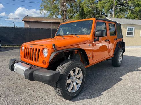 Used 2013 Jeep Wrangler Unlimited Sahara w/ Connectivity Group AWD/4WD image 1