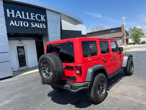 Used 2013 Jeep Wrangler Unlimited Sahara w/ Dual Top Group AWD/4WD image 6
