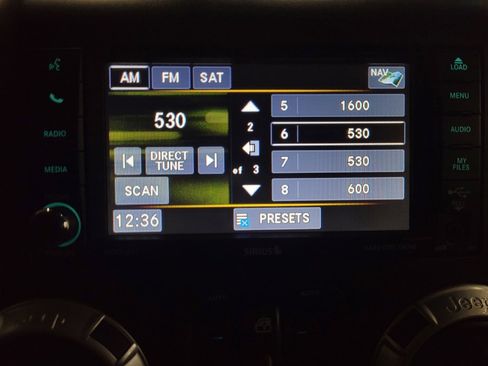 Used 2014 Jeep Wrangler Unlimited Sahara w/ Dual Top Group AWD/4WD image 25