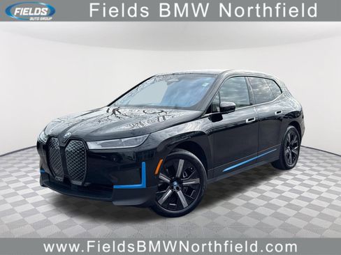 Certified 2023 BMW iX xDrive50 w/ BMW I Signature Blue Package image 1