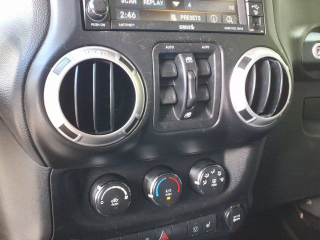 Used 2013 Jeep Wrangler Unlimited Sahara w/ Dual Top Group AWD/4WD image 21