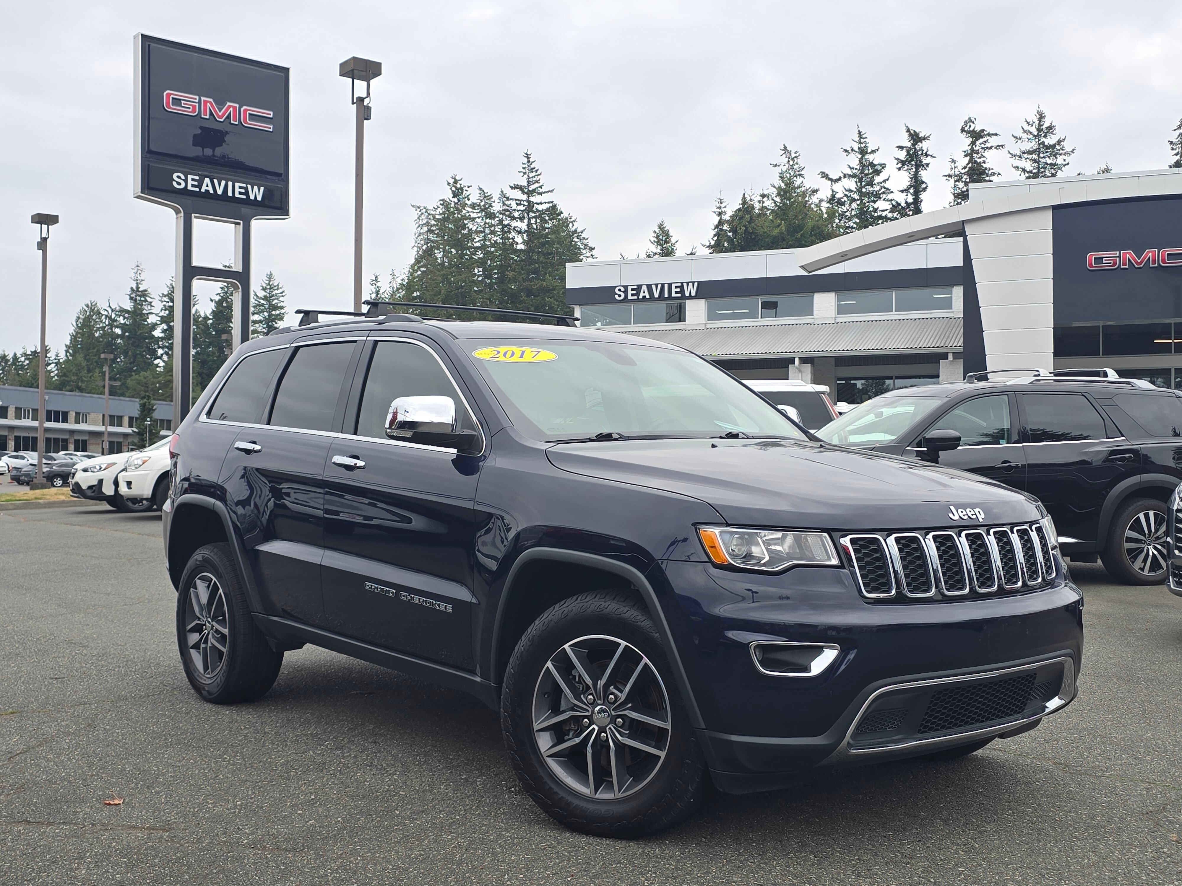 Used 2017 Jeep Grand Cherokee Limited AWD/4WD image 1