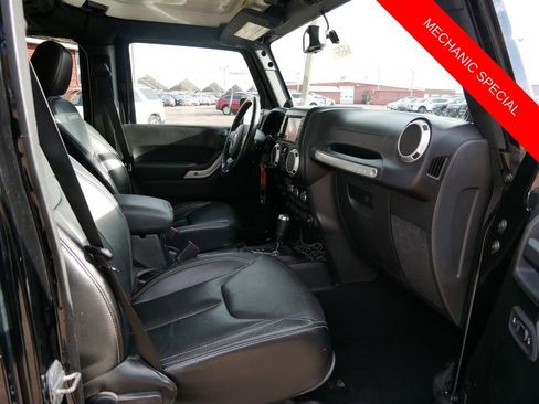 Used 2013 Jeep Wrangler Unlimited Rubicon w/ Dual Top Group AWD/4WD image 9