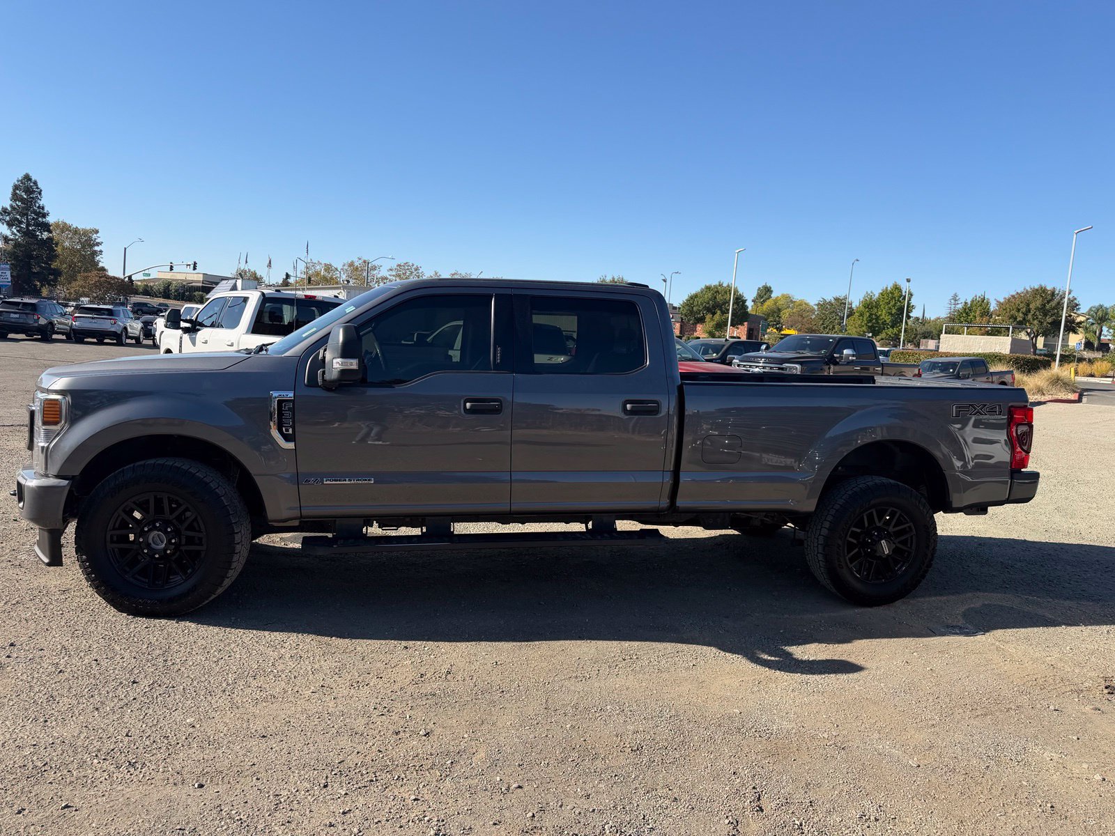 Used 2022 Ford F350 XLT w/ Black Appearance Package AWD/4WD image 2