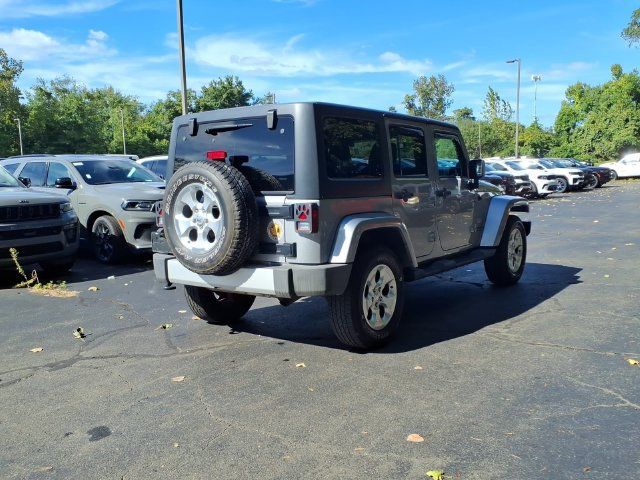 Used 2013 Jeep Wrangler Unlimited Sahara w/ Dual Top Group AWD/4WD image 7