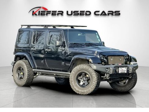 Used 2013 Jeep Wrangler Unlimited Sahara AWD/4WD image 2