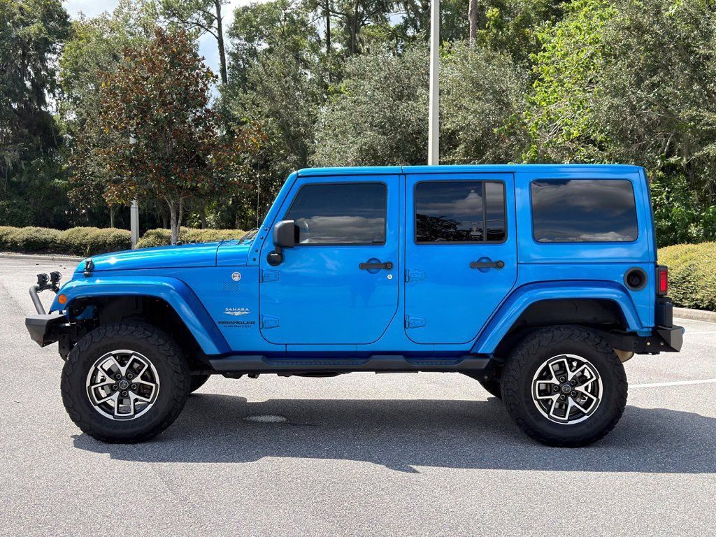 Used 2015 Jeep Wrangler Unlimited Sahara w/ Dual Top Group AWD/4WD image 2