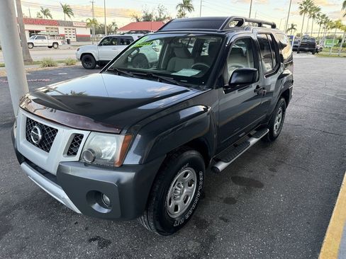 Used 2013 Nissan Xterra X image 1