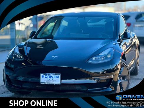 Used 2021 Tesla Model 3 Standard Range Plus image 1