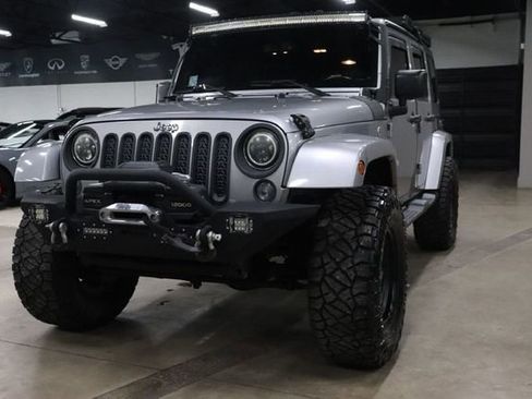 Used 2016 Jeep Wrangler Unlimited Sahara AWD/4WD image 1