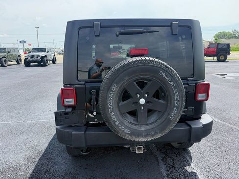 Used 2013 Jeep Wrangler Unlimited Sport w/ Dual Top Group AWD/4WD image 25