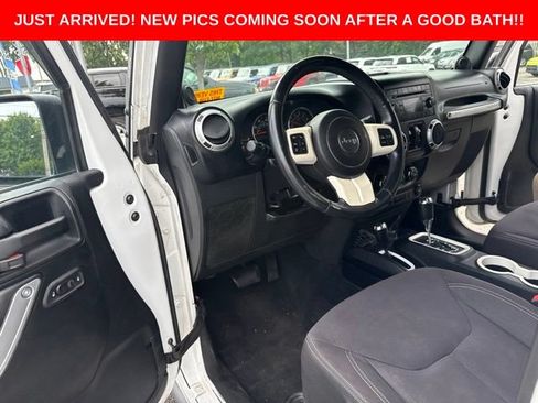 Used 2013 Jeep Wrangler Unlimited Sahara w/ Dual Top Group AWD/4WD image 11
