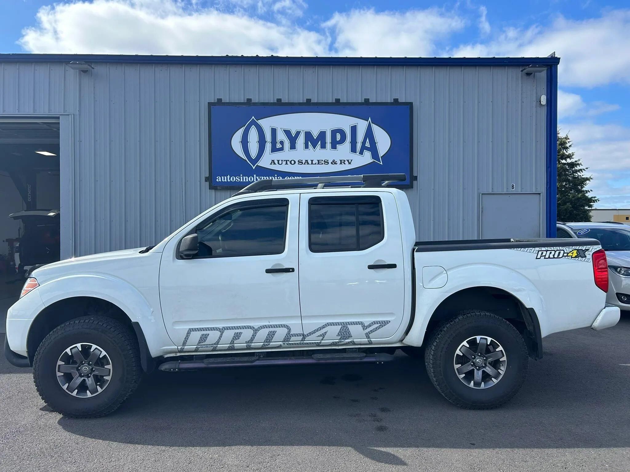Used 2014 Nissan Frontier PRO-4X AWD/4WD image 1