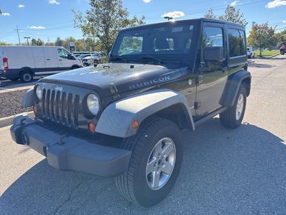 Used 2011 Jeep Wrangler Rubicon w/ Dual Top Group