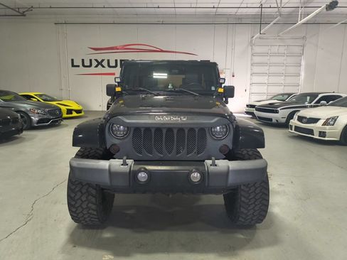 Used 2010 Jeep Wrangler Unlimited Sahara w/ Dual Top Group AWD/4WD image 8