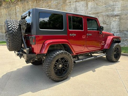 Used 2013 Jeep Wrangler Unlimited Sahara w/ Dual Top Group AWD/4WD image 12