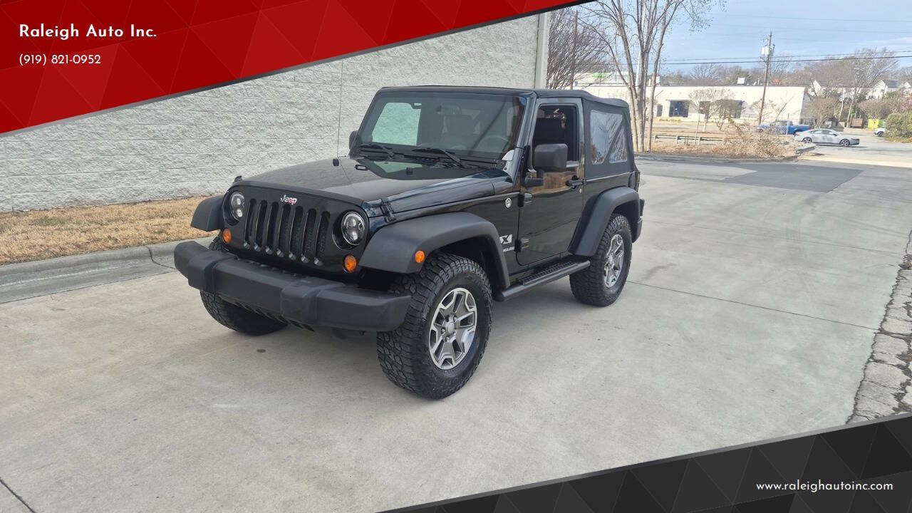 Used 2009 Jeep Wrangler X w/ Black Appearance Group AWD/4WD image 1