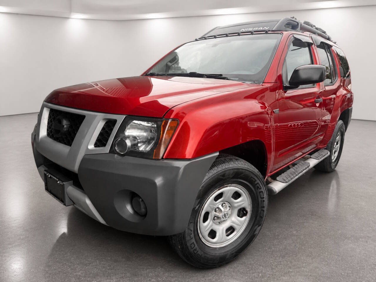 Used 2013 Nissan Xterra X AWD/4WD image 1