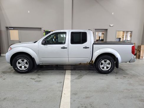 Used 2013 Nissan Frontier SV image 1
