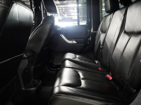 Used 2015 Jeep Wrangler Unlimited Sahara w/ Dual Top Group AWD/4WD image 14